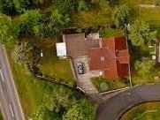 Luftaufnahme eines Einfamilienhauses in Bönen – Beispiel für ein regionales Baugebiet mit guter Lage für den Hausbau.